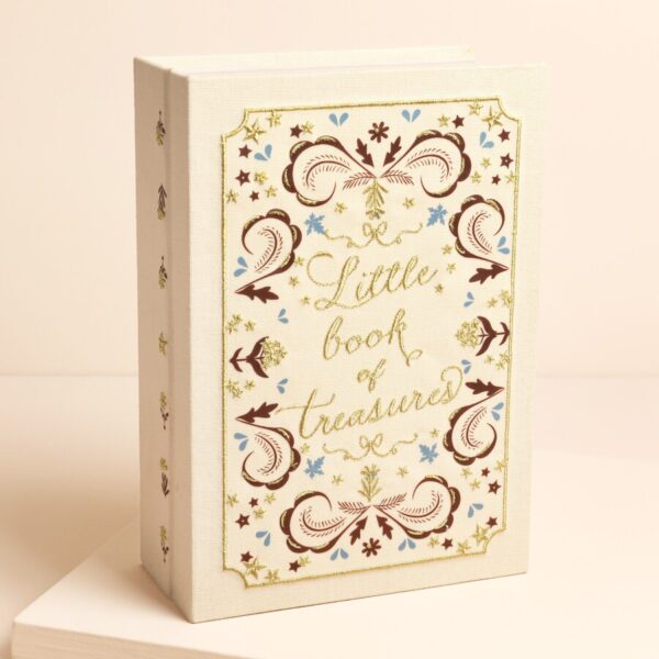 Novel “book of treasures” linen jewellery case in cream